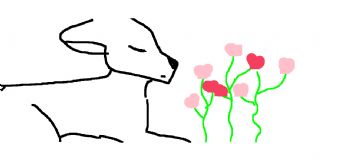 Pieni eläin haistelee kukkia kukkaryppään edessä