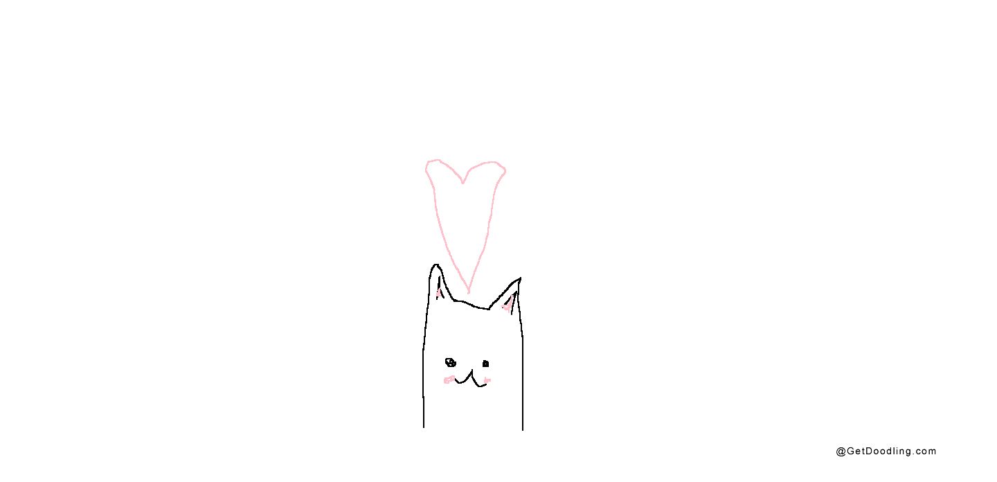 A little cat with a heart on its head